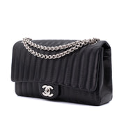 Chanel Classic Single Flap Medium Lammleder Schwarz Mademoiselle Vertical Quilted SHW