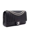 Chanel Classic Single Flap Medium Lammleder Schwarz Mademoiselle Vertical Quilted SHW