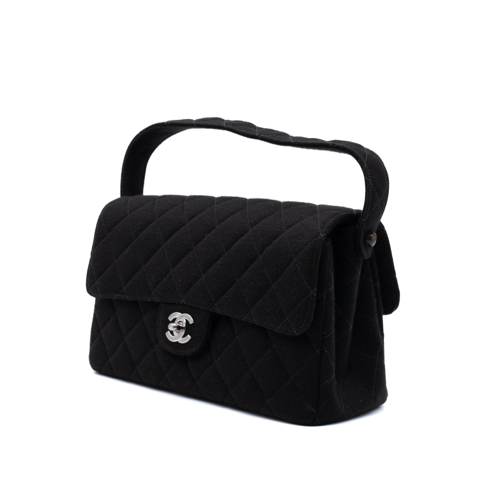 Schwarze Chanel Timeless Handtasche Double Face Medium Größe aus Jersey Material mit silberner Hardware Halbe Seitenansicht vorne