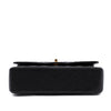 Chanel Classic Timeless Double Flap Bag in Medium Größe aus schwarzem Caviar Leder Material mit goldener Hardware