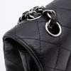 Chanel Classic Timeless Double Flap Bag in Medium Größe aus schwarzem Caviar Leder Material mit silberner Hardware