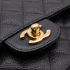 Chanel Classic Timeless Double Flap Bag in Medium Größe aus schwarzem Caviar Leder Material mit goldener Hardware