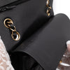 Chanel Classic Timeless Double Flap Bag in Medium Größe aus schwarzem Caviar Leder Material mit goldener Hardware