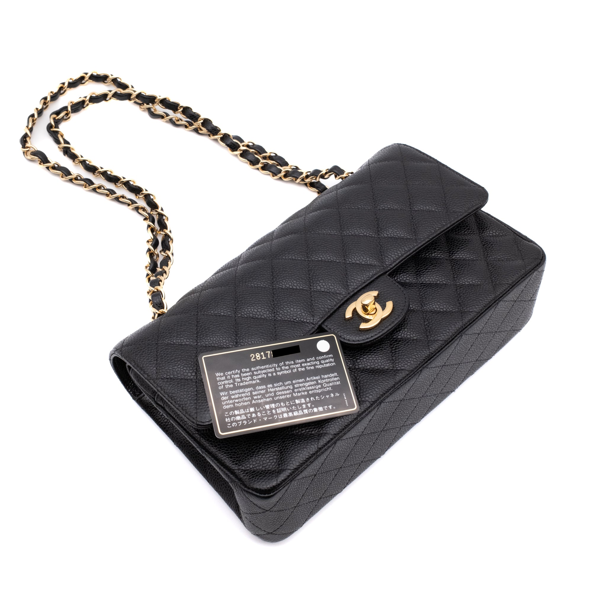Chanel Classic Timeless Double Flap Bag in Medium Größe aus schwarzem Caviar Leder Material mit goldener Hardware