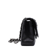Chanel Classic Timeless Double Flap Bag in Medium Größe aus schwarzem Caviar Leder Material mit silberner Hardware