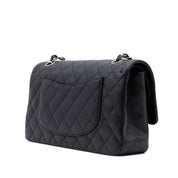 Chanel Classic Timeless Double Flap Bag in Medium Größe aus schwarzem Caviar Leder Material mit silberner Hardware