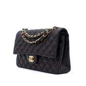 Chanel Classic Timeless Double Flap Bag in Medium Größe aus schwarzem Lammleder Material mit goldener Hardware