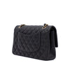 Chanel Classic Timeless Double Flap Bag in Medium Größe aus schwarzem Lammleder Material mit goldener Hardware