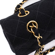 Vintage Chanel Classic Timeless Double Flap Bag in Medium Größe aus schwarzem Leinen Canvas Material mit goldener Hardware