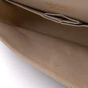 Gestreifte Chanel Classic Timeless Double Flap Bag in Medium Größe aus schwarz weißem Jersey Material mit goldener Hardware aus der limitierten Coco Sailor Kollektion