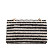 Gestreifte Chanel Classic Timeless Double Flap Bag in Medium Größe aus schwarz weißem Jersey Material mit goldener Hardware aus der limitierten Coco Sailor Kollektion Rückansicht