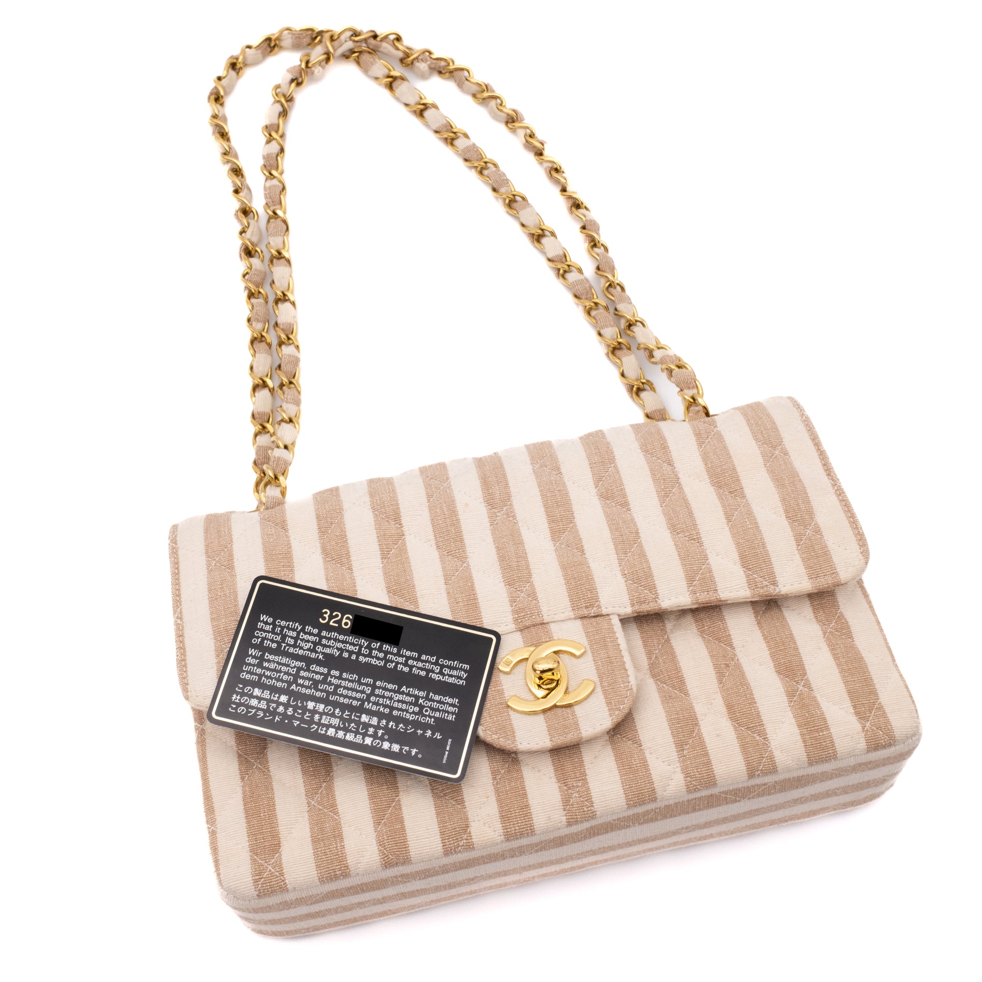 Gestreifte Vintage Chanel Timeless Double Flap Bag Handtasche in  Small Größe aus Baumwolle Canvas Leinen Material mit goldener Hardware Liegend  