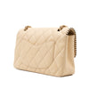Beige Chanel Timeless Handtasche Single Flap Bag Medium Größe aus Lammleder Material mit goldener Hardware und schwarzer Trimm Zierborte halbe Rückseite inks 