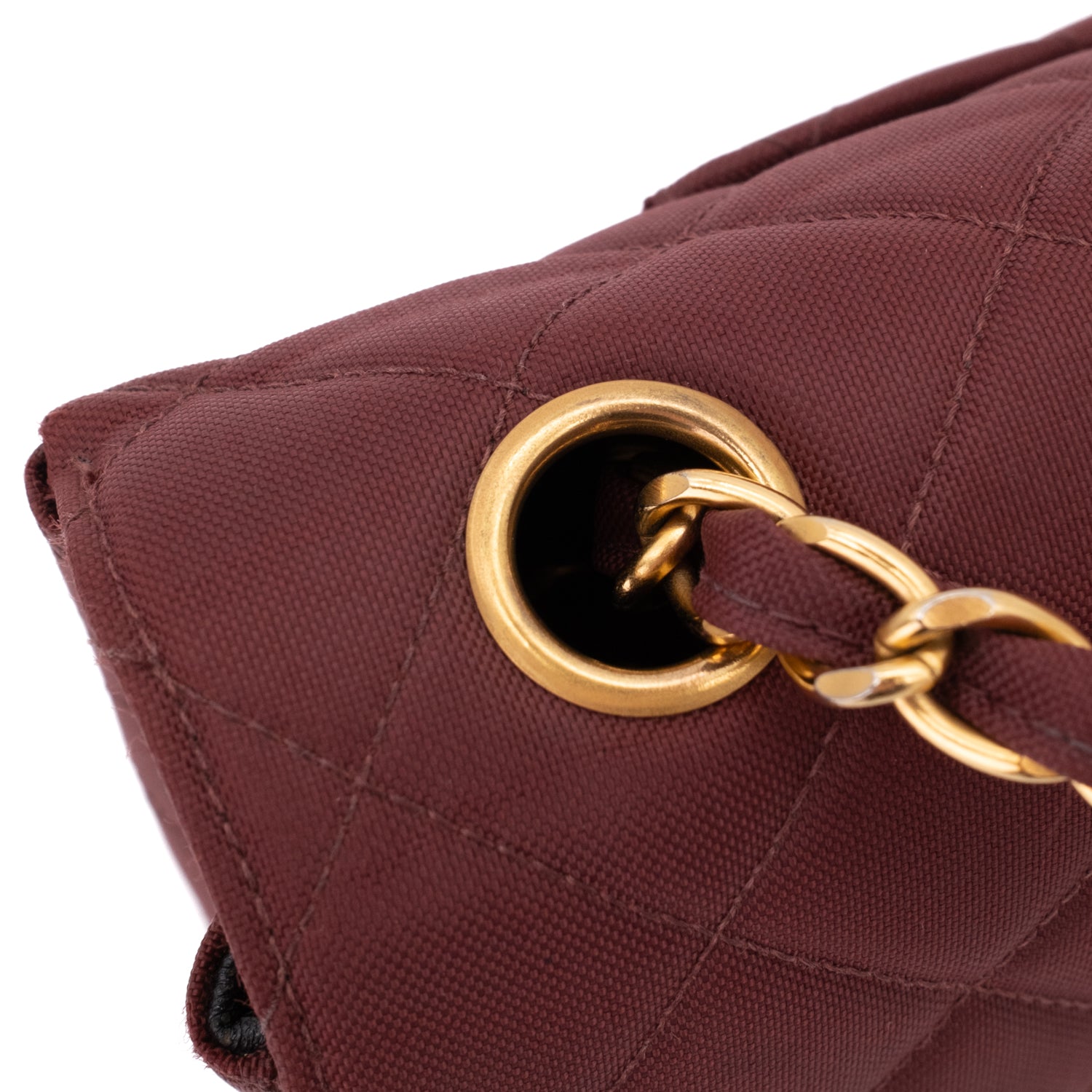 Weinrote Chanel Single Flap Bag in Medium Größe aus burgundy farbendem Jersey Material mit goldener Hardware