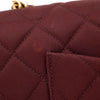 Weinrote Chanel Single Flap Bag in Medium Größe aus burgundy farbendem Jersey Material mit goldener Hardware