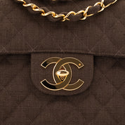 Vintage Chanel Classic Timeless Single Flap Bag in Jumbo Maxi Größe aus braunem Leinen Canvas Material mit goldener Hardware CC Verschluss