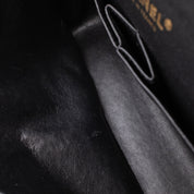 Chanel Classic Timeless Double Flap Bag in Medium Größe aus schwarzem Caviar Leder Material mit goldener Hardware 