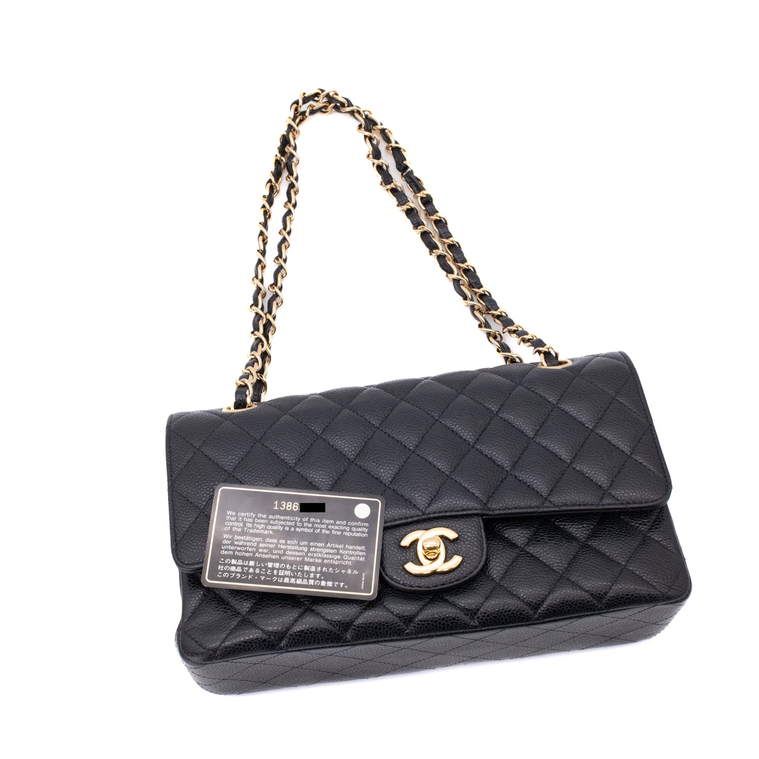 Chanel Classic Timeless Double Flap Bag in Medium Größe aus schwarzem Caviar Leder Material mit goldener Hardware 