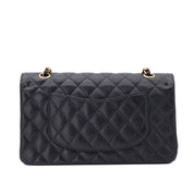 Chanel Classic Timeless Double Flap Bag in Medium Größe aus schwarzem Caviar Leder Material mit goldener Hardware 