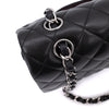 Chanel Classic Timeless Double Flap Bag in Medium Größe aus schwarzem Lammleder Material mit silberner Hardware