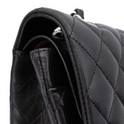 Chanel Classic Timeless Double Flap Bag in Medium Größe aus schwarzem Lammleder Material mit silberner Hardware