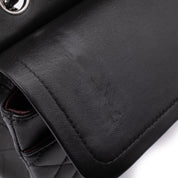 Chanel Classic Timeless Double Flap Bag in Medium Größe aus schwarzem Lammleder Material mit silberner Hardware