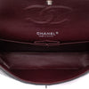 Chanel Classic Timeless Double Flap Bag in Medium Größe aus schwarzem Lammleder Material mit silberner Hardware