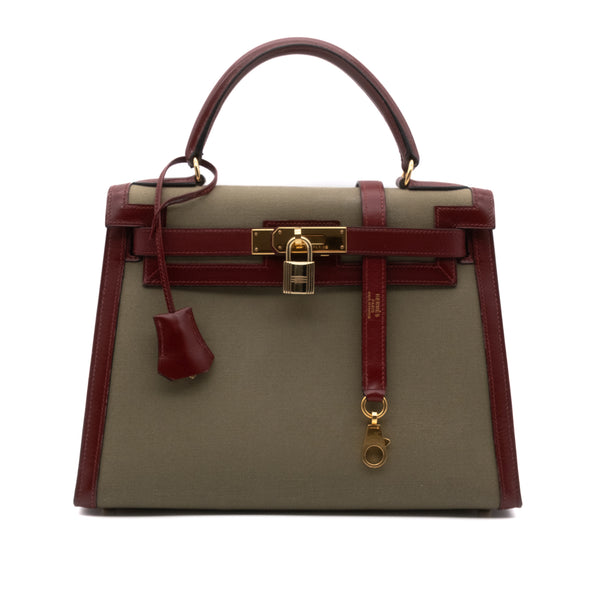 Hermès Kelly 28 Etoile aus weinrotem Rouge H Boxcalf Leder und Khakifarbenem Canvas Material im Sellier Stil und mit goldener Hardware Vorderansicht 