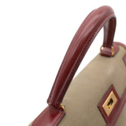 Hermès Kelly 28 Etoile aus weinrotem Rouge Ash Boxcalf Leder und Khakifarbenem Canvas Material im Sellier Stil und mit goldener Hardware