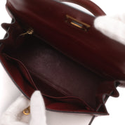 Hermès Kelly 28 Etoile aus weinrotem Rouge Ash Boxcalf Leder und Khakifarbenem Canvas Material im Sellier Stil und mit goldener Hardware
