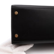 Hermès Kelly 28 aus schwarzem Boxcalf Leder im Sellier Stil mit goldener Hardware